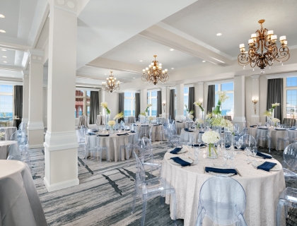 meeting room with round tables and ocean view