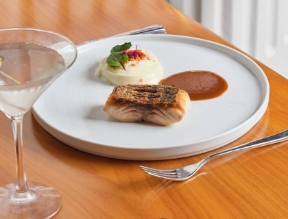 Fish dish on a plate on the table