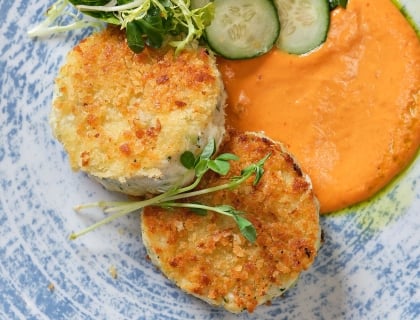 Crab cakes on patterned plate