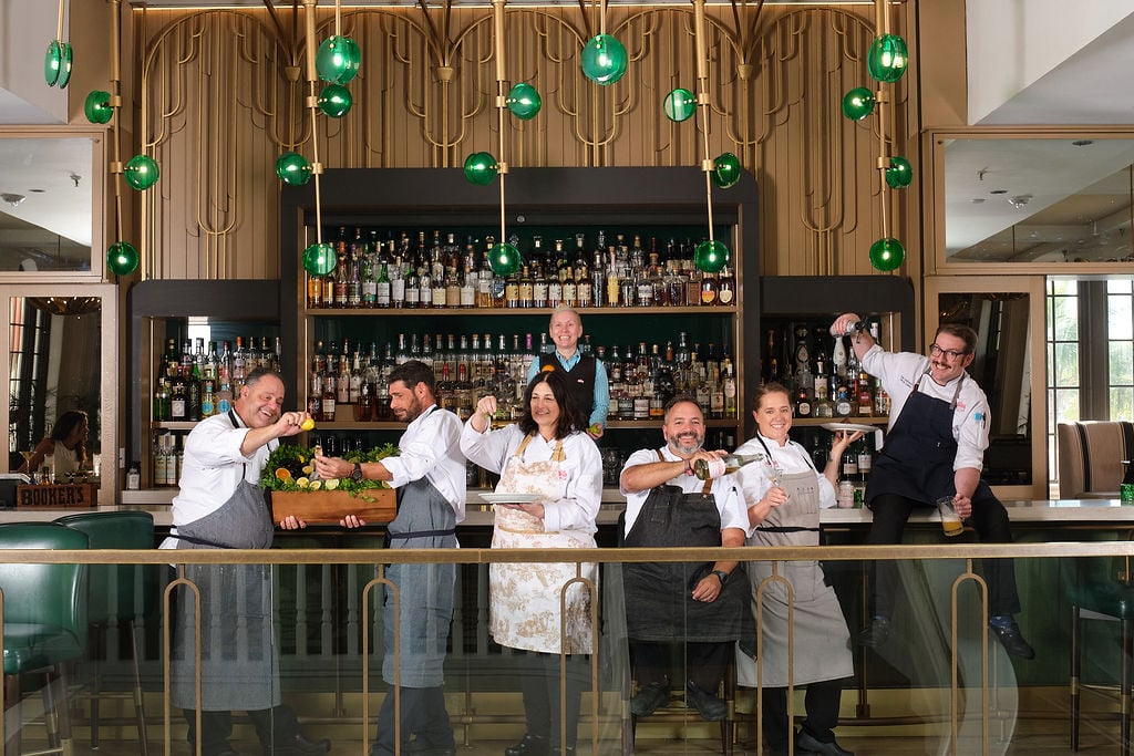 Chefs at The Don CeSar standing in front of the bar